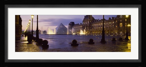 Framed Buildings lit up at night, Louvre Museum, Paris, France Print