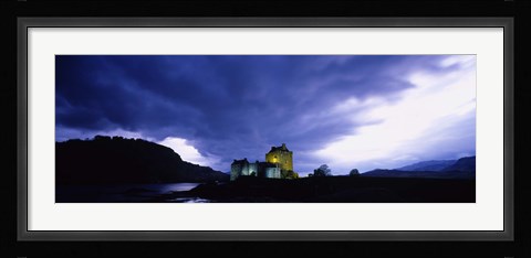 Framed Low Angle View Of A Castle Lit Up At Dusk, Eilean Donan Castle, Highlands, Scotland, United Kingdom Print