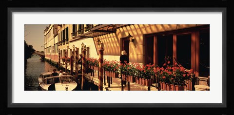 Framed Boat outside of a tourist resort, Venice, Italy Print