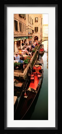Framed Gondolas moored outside of a cafe, Venice, Italy Print