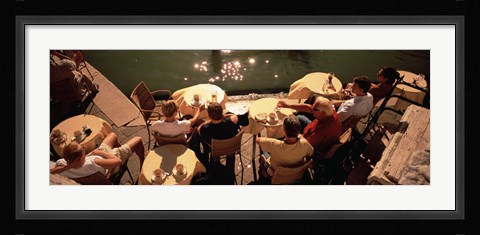 Framed High angle view of tourists sitting along a canal, Venice, Italy Print