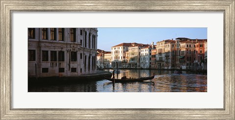 Framed Man on a gondola in a canal, Grand Canal, Venice, Italy Print