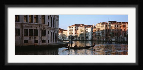 Framed Man on a gondola in a canal, Grand Canal, Venice, Italy Print