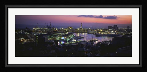 Framed High angle view of city at a port lit up at dusk, Genoa, Liguria, Italy Print