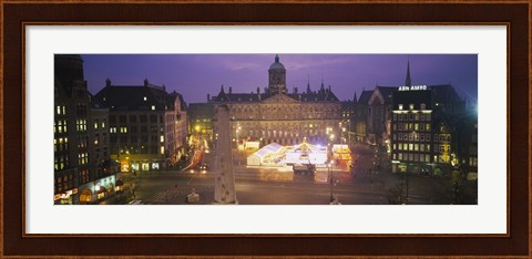 Framed High angle view of a town square lit up at dusk, Dam Square, Amsterdam, Netherlands Print