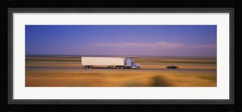 Framed Truck and a car moving on a highway, Highway 5, California, USA Print