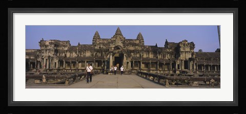 Framed Tourists walking in front of an old temple, Angkor Wat, Siem Reap, Cambodia Print