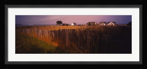 Framed Wooden fence in a field with houses in the background, Mendocino, California, USA Print