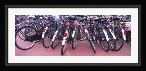 Framed Bicycles parked in a parking lot, Amsterdam, Netherlands Print