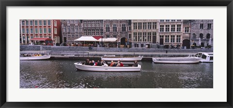 Framed High angle view of tourboats in a river, Leie River, Graslei, Ghent, Belgium Print