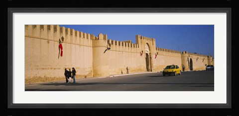 Framed Car on a road in front of a fortified wall, Medina, Kairwan, Tunisia Print