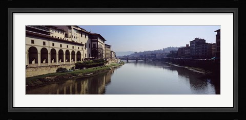 Framed Buildings along a river, Uffizi Museum, Ponte Vecchio, Arno River, Florence, Tuscany, Italy Print