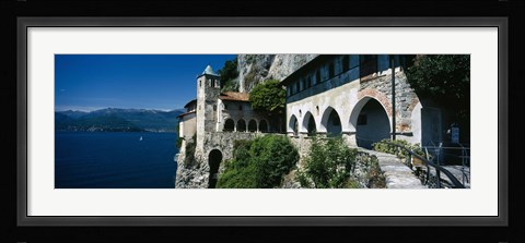 Framed Walkway along a building at a lake, Santa Caterina del Sasso, Lake Maggiore, Piedmont, Italy Print