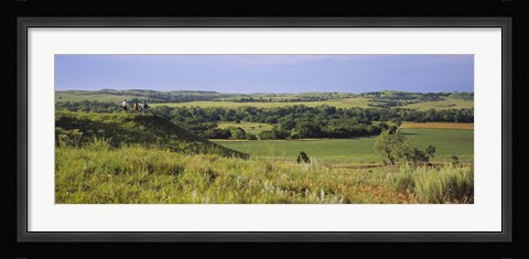 Framed Three mountain bikers on a hill, Kansas, USA Print