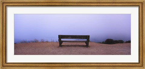 Framed Empty bench in a parking lot, California, USA Print