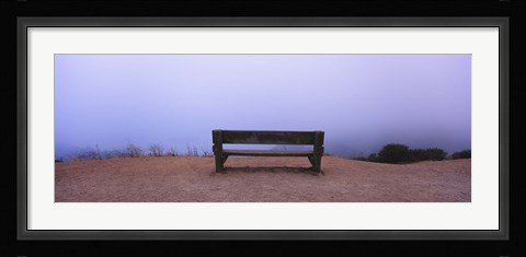 Framed Empty bench in a parking lot, California, USA Print
