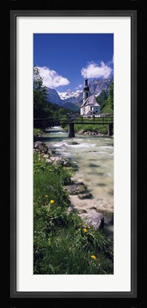 Framed Bridge over stream below country church, Bavarian Alps, Germany. Print