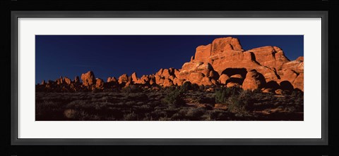 Framed Rock formations on an arid landscape, Arches National Park, Moab, Grand County, Utah, USA Print