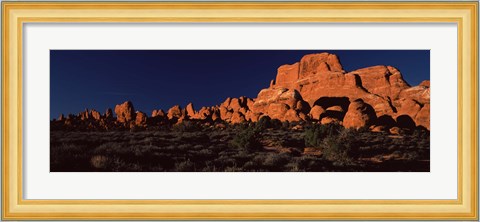 Framed Rock formations on an arid landscape, Arches National Park, Moab, Grand County, Utah, USA Print