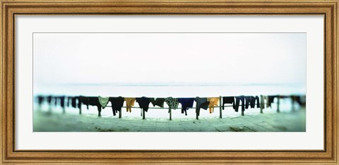 Framed Clothes drying at the riverbank, Ganges River, Varanasi, Uttar Pradesh, India Print