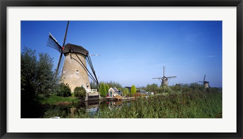 Framed Traditional windmills in a field, Netherlands Print