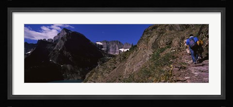 Framed Hikers hiking on a mountain, US Glacier National Park, Montana, USA Print