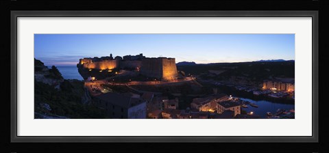 Framed Castle lit up at night, Bonifacio Harbour, Corsica, France Print