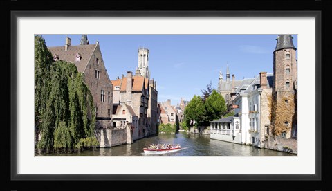 Framed Tourboat in a canal, Bruges, West Flanders, Belgium Print
