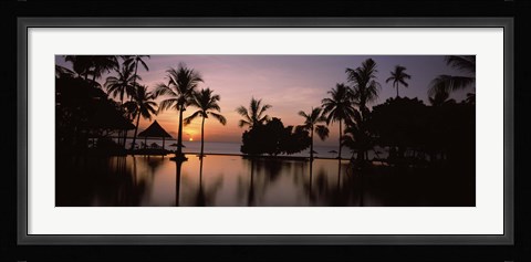 Framed Sunset over hotel pool, Lombok, West Nusa Tenggara, Indonesia Print