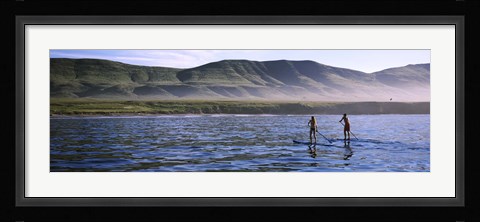 Framed Tourists paddleboarding in the pacific ocean, Santa Cruz Island, Santa Barbara County, California Print