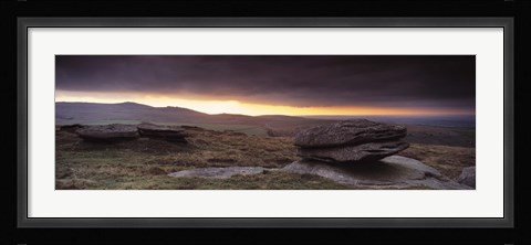 Framed Bright horizon with dark clouds from Higher Tor, Dartmoor, Devon, England Print