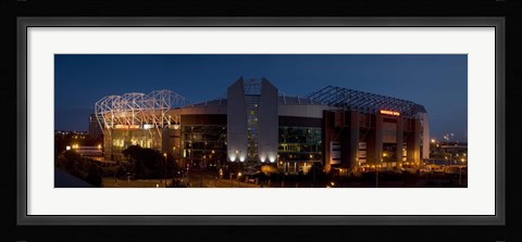 Framed Football stadium lit up at night, Old Trafford, Greater Manchester, England Print