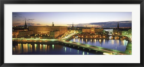Framed Royal Palace and Parliament building lit up at dusk, Stockholm, Sweden Print