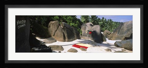 Framed Nudist corner written on a rock on the beach, Mahe Island, Seychelles Print