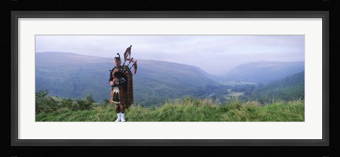 Framed Bagpiper at Loch Broom in Scottish highlands, Ross and Cromarty, Scotland Print
