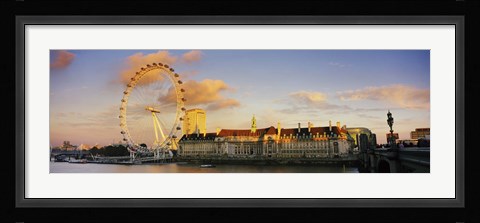 Framed Ferris wheel with buildings at waterfront, Millennium Wheel, London County Hall, Thames River, South Bank, London, England Print