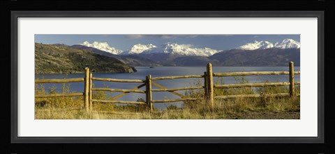 Framed Fence in front of a lake with mountains in the background, Lake General Carrera, Andes, Patagonia, Chile Print