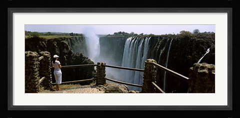 Framed Woman looking at the Victoria Falls from a viewing point, Zambia Print