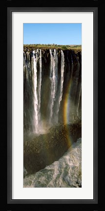 Framed Rainbow forms in the water spray in the gorge at Victoria Falls, Zimbabwe Print