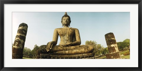 Framed Low angle view of a statue of Buddha, Sukhothai Historical Park, Sukhothai, Thailand Print