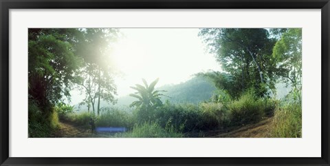 Framed Man with a slingshot in a forest, Chiang Mai, Thailand Print