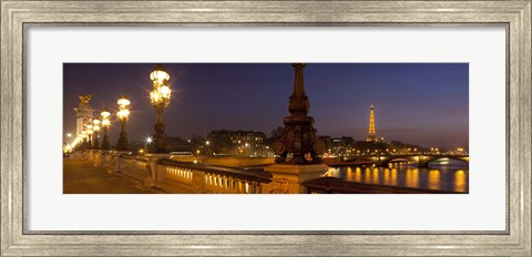 Framed Bridge across the river lit up at dusk, Pont Alexandre III, Seine River, Paris, Ile-De-France, France Print