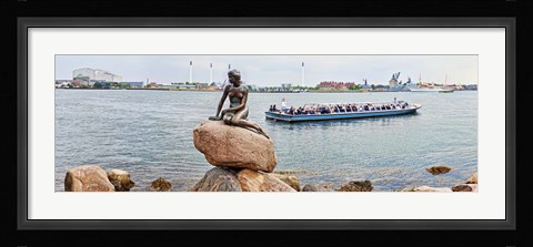 Framed Little Mermaid Statue with tourboat in a canal, Copenhagen, Denmark Print