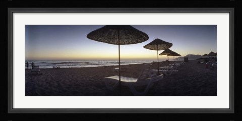 Framed Beach chairs and straw sun umbrellas on Patara Beach on the Mediterranean Sea at sunset, Patara, Antalya Province, Turkey Print