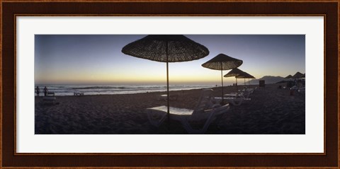 Framed Beach chairs and straw sun umbrellas on Patara Beach on the Mediterranean Sea at sunset, Patara, Antalya Province, Turkey Print