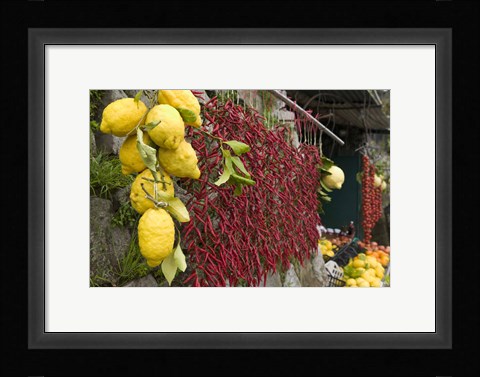 Framed Close-up of lemons and chili peppers in a market stall, Sorrento, Naples, Campania, Italy Print