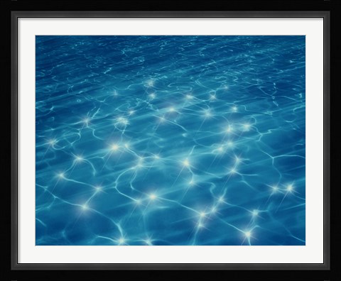 Framed Dancing lights under deep blue water Print