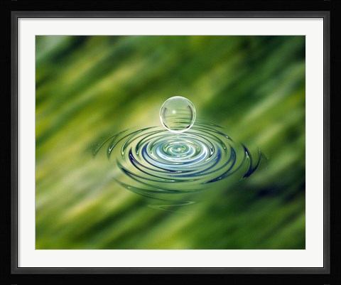 Framed Clear bubble rising from ripples in mottled green water Print