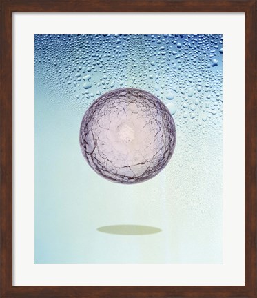 Framed Crystal sphere floating in water and bubbles Print