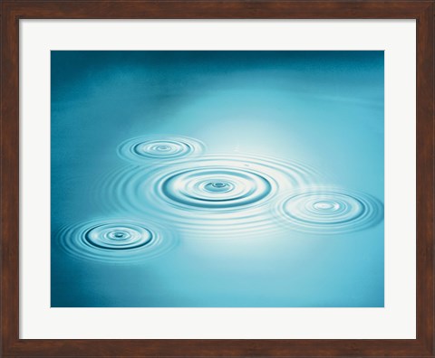 Framed Multiple rings in blue water with bright light reflection Print